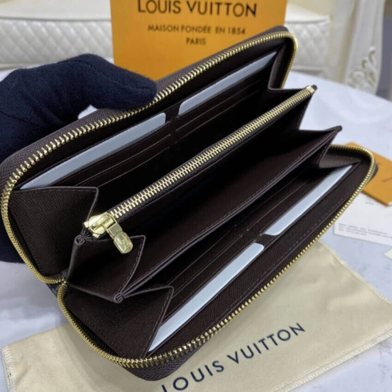 This iconi Louis Vuitton Damier Ebene Zippy Wallet Brown - Image 10