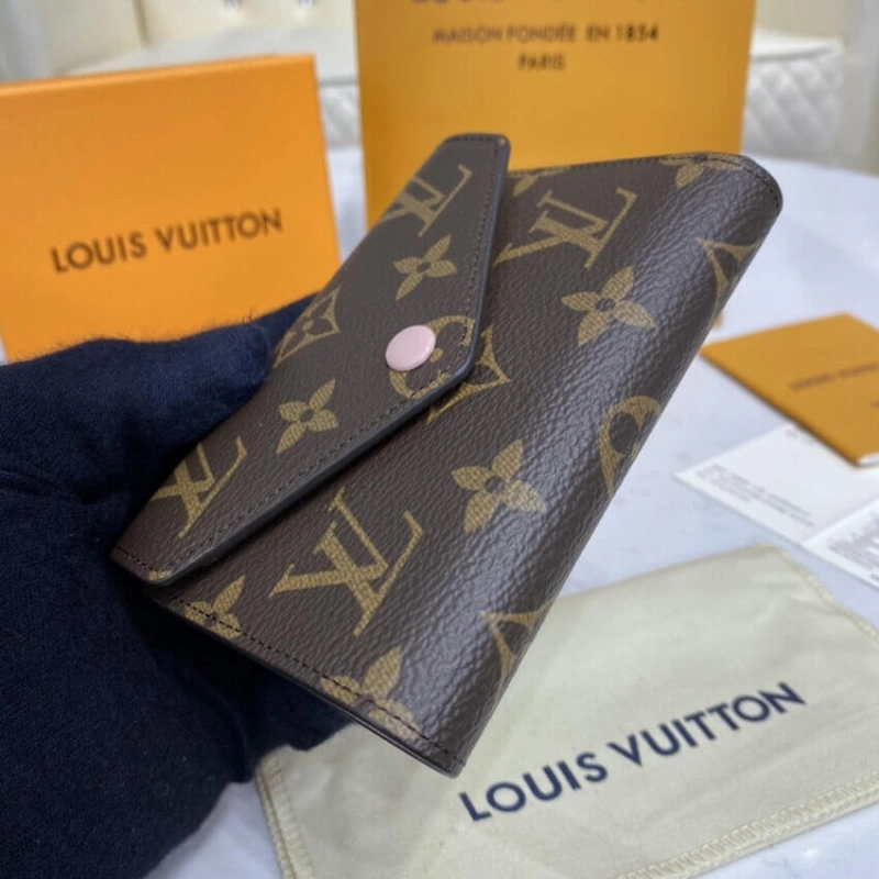 The compac Louis Vuitton Monogram Canvas Victorine Wallet Pink - Image 4