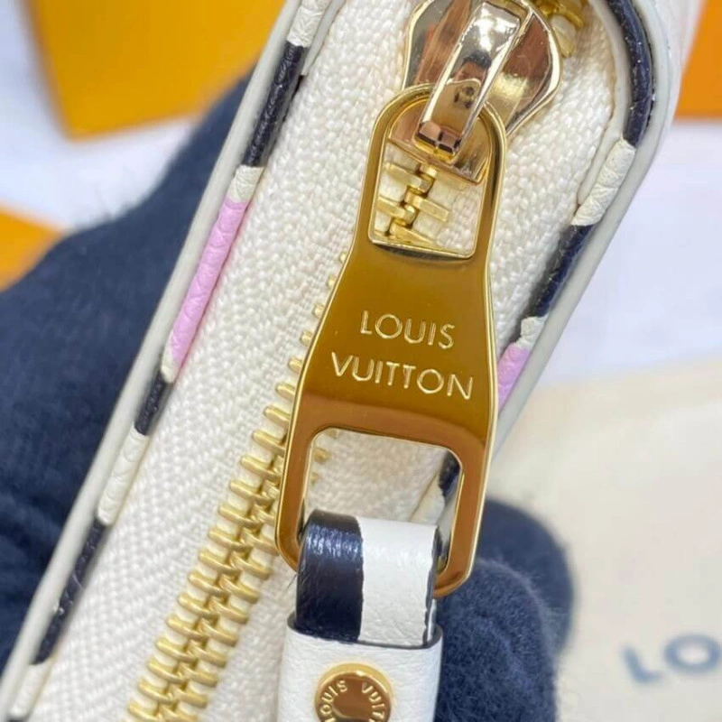 Louis Vuitton Monogram Empreinte Leather with Animal-Print Zippy Wallet Cream - Image 6