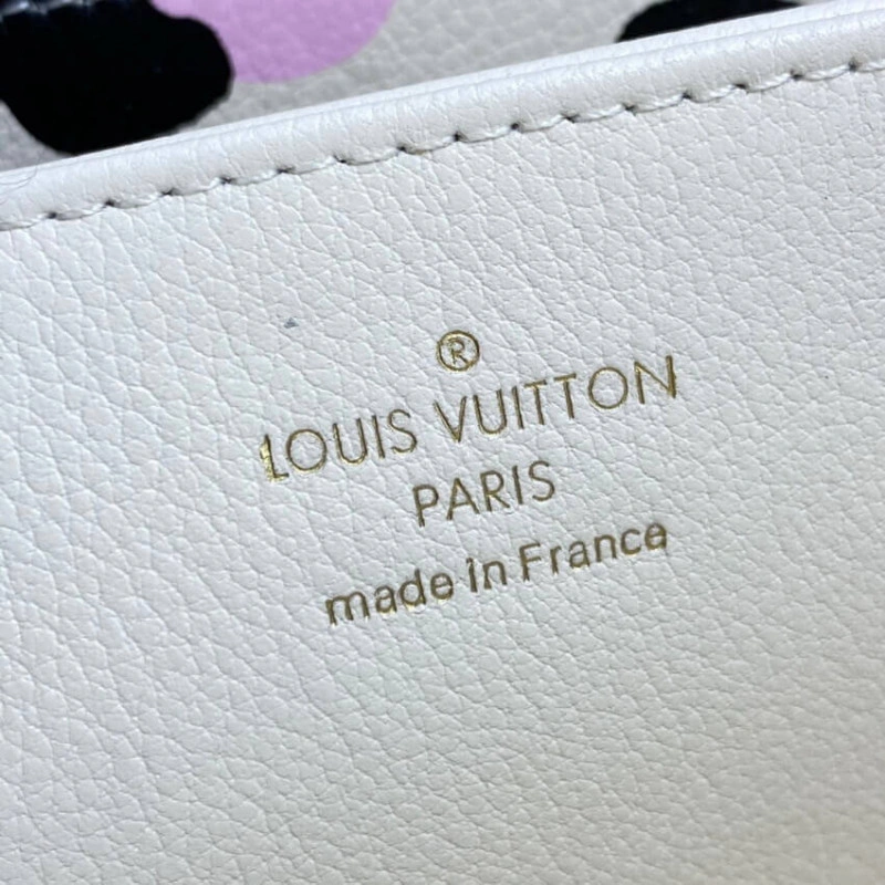 Louis Vuitton Monogram Empreinte Leather with Animal-Print Zippy Wallet Cream - Image 8